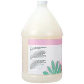 Close-up silky lather texture of Ginger Lily Farms body wash showing softening effect