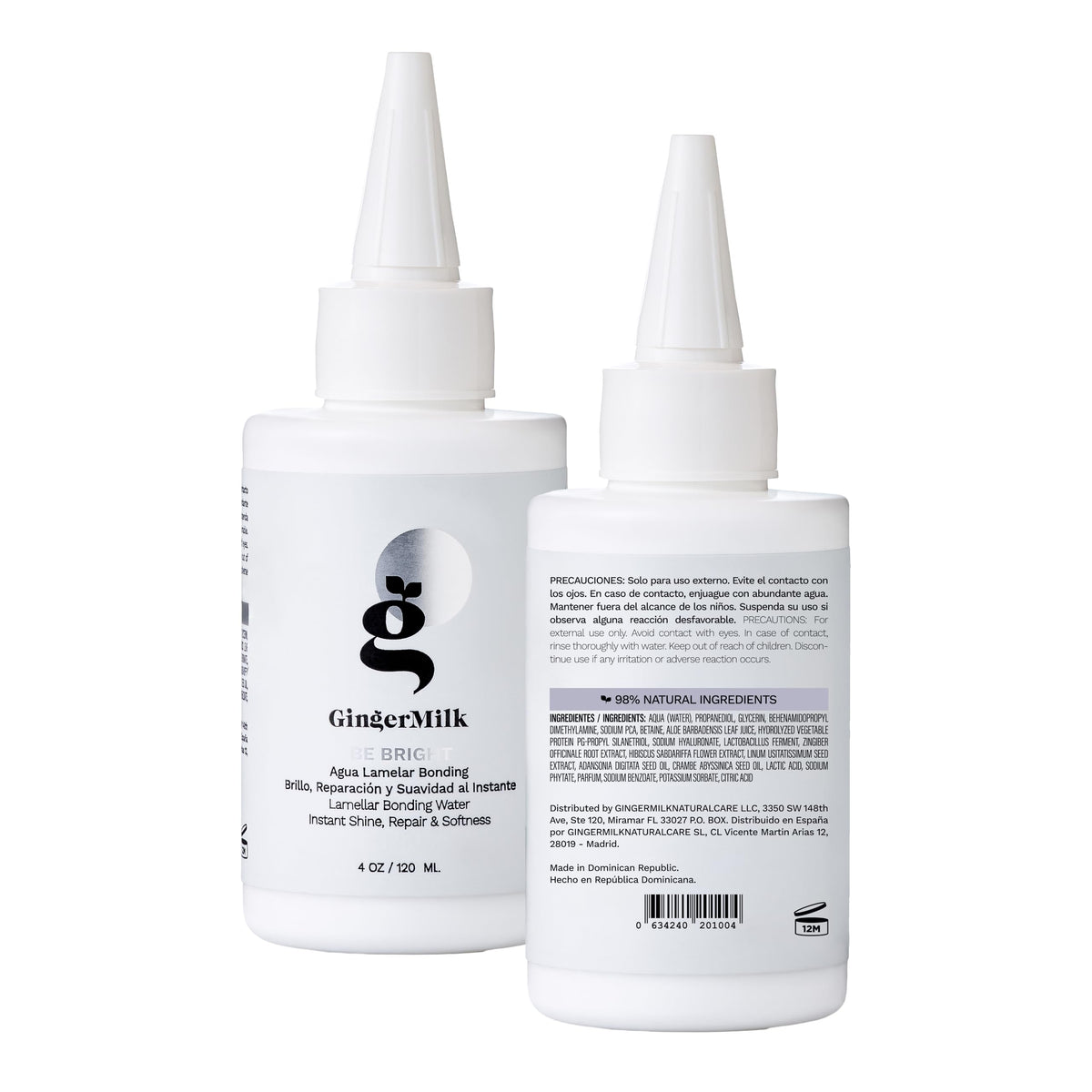 Ginger Milk Natural Care 4 oz bottle held next to a hand for size and portability