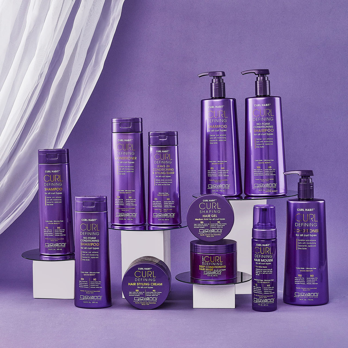 GIOVANNI being applied to damp curls for improved definition benefit