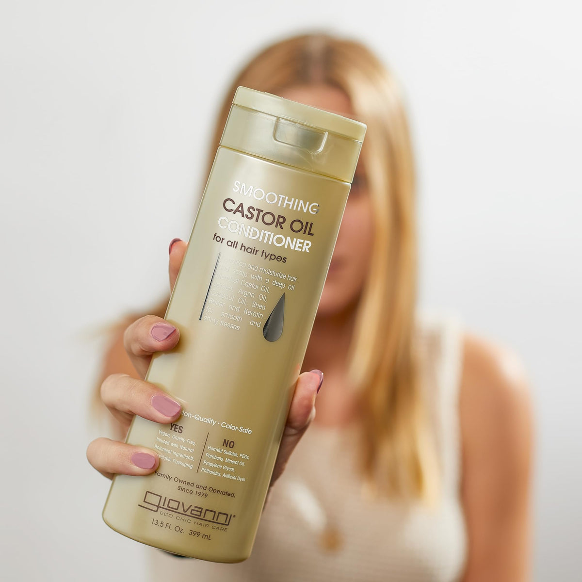 Giovanni conditioner cream texture close-up demonstrating smooth consistency for easy application