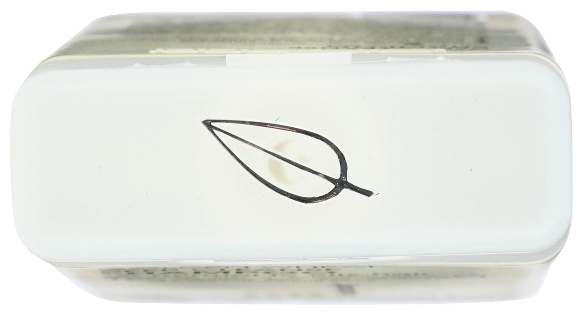 GIOVANNI bottle held in hand to show 8.5 oz size and travel-friendly scale