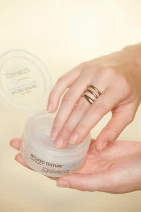 GIOVANNI jar open top view revealing creamy wax texture and easy scoopability
