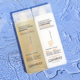 GIOVANNI shampoo in hand on wet hair demonstrating slip and hydration benefit