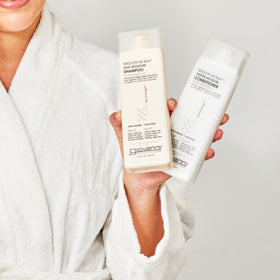 GIOVANNI creamy conditioner texture showing rich slip benefit