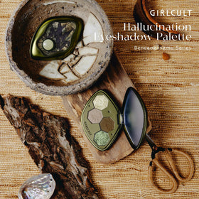 GIRLCULT palette held in hand to show compact size and grab-and-go convenience