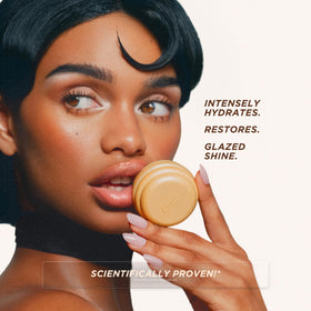 Gisou being applied to lips showcasing instant glazed shine and softening benefit