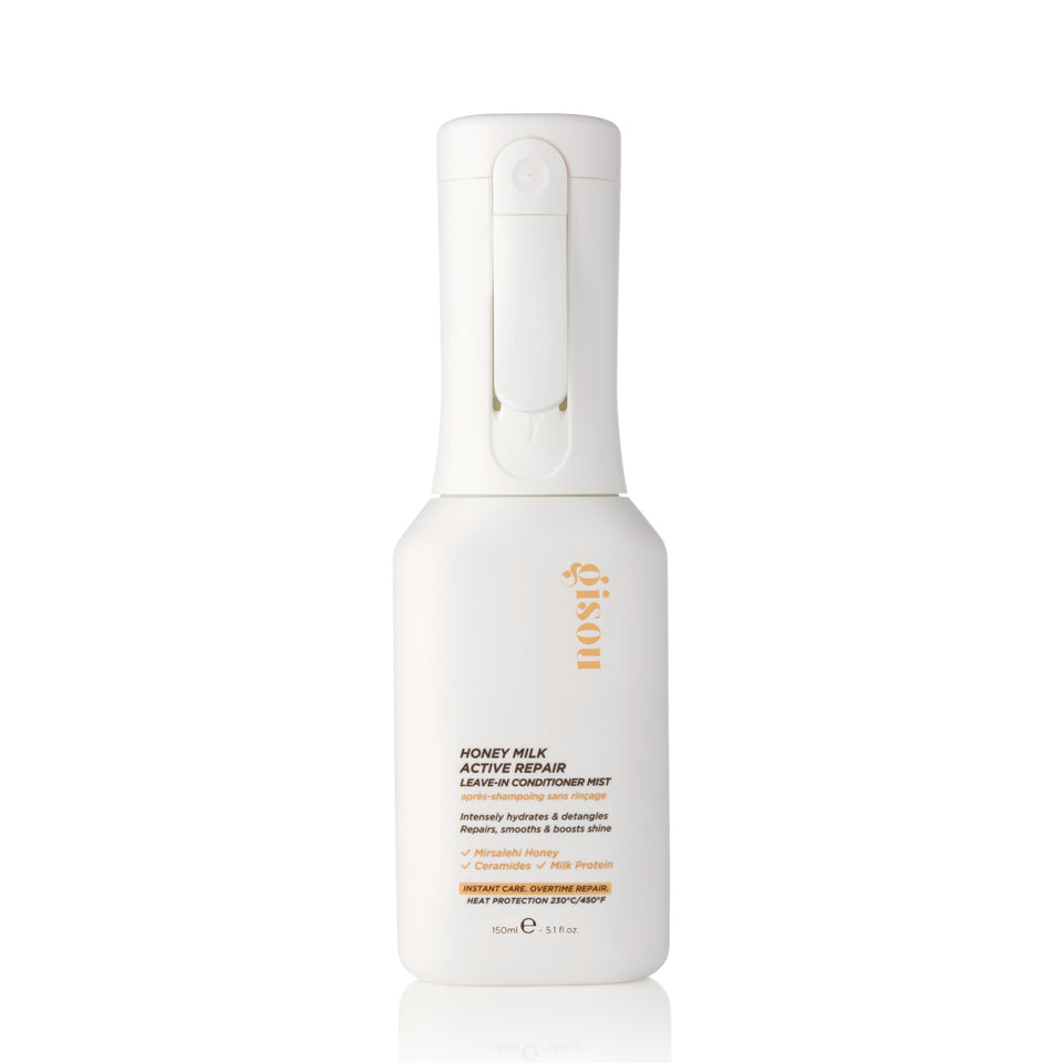 Gisou front bottle shot showing sleek packaging and easy spray for quick care