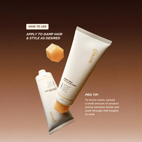 Gisou styling cream on bathroom shelf in lifestyle setting for daily use