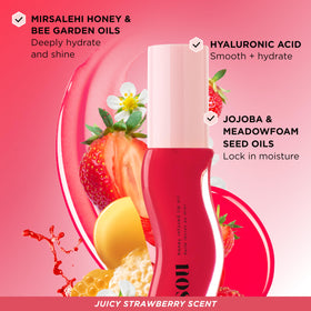 Gisou lip oil worn on lips in lifestyle shot for hydrated, glossy look