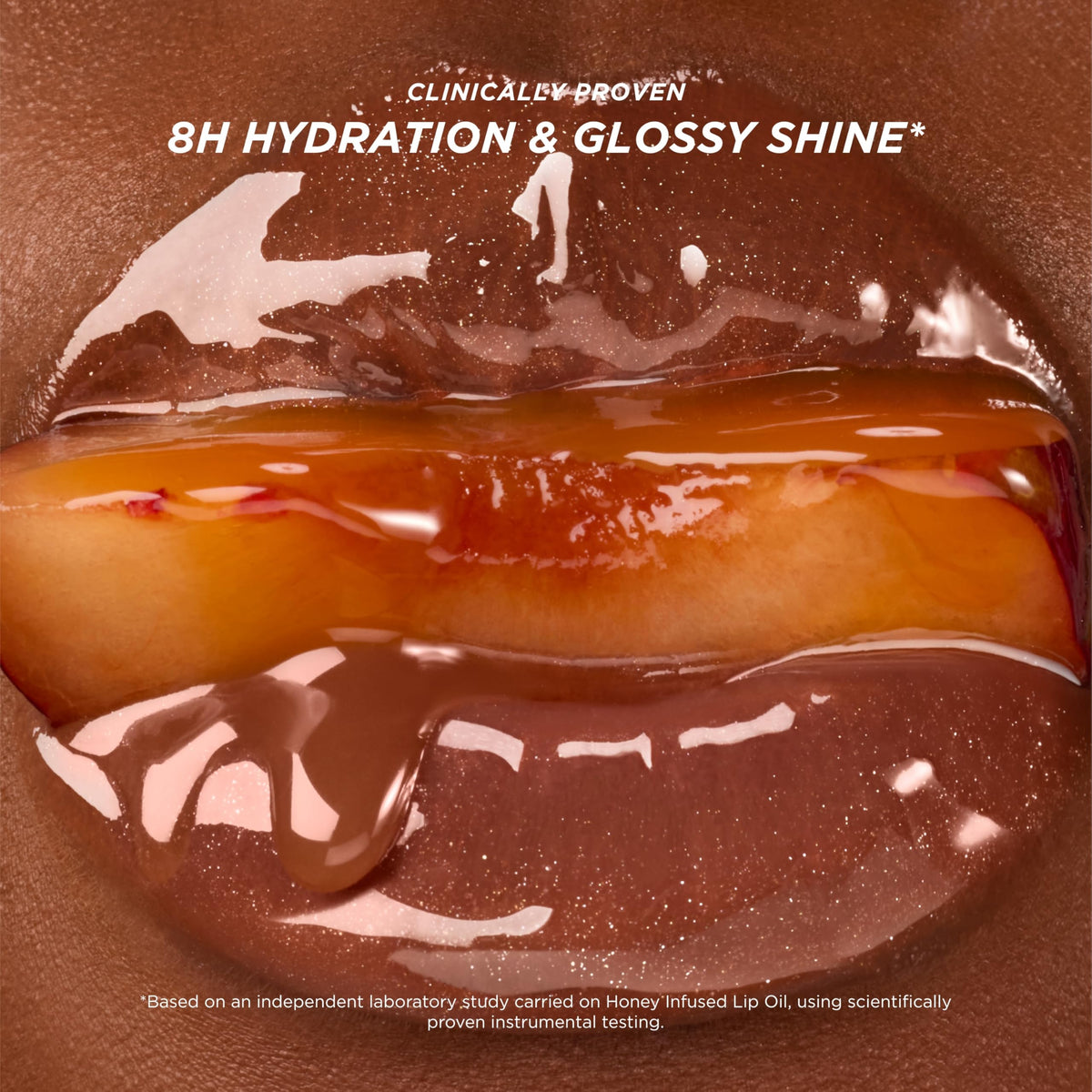 Gisou lip swatch Glazed Plum on model showing hydrated shine