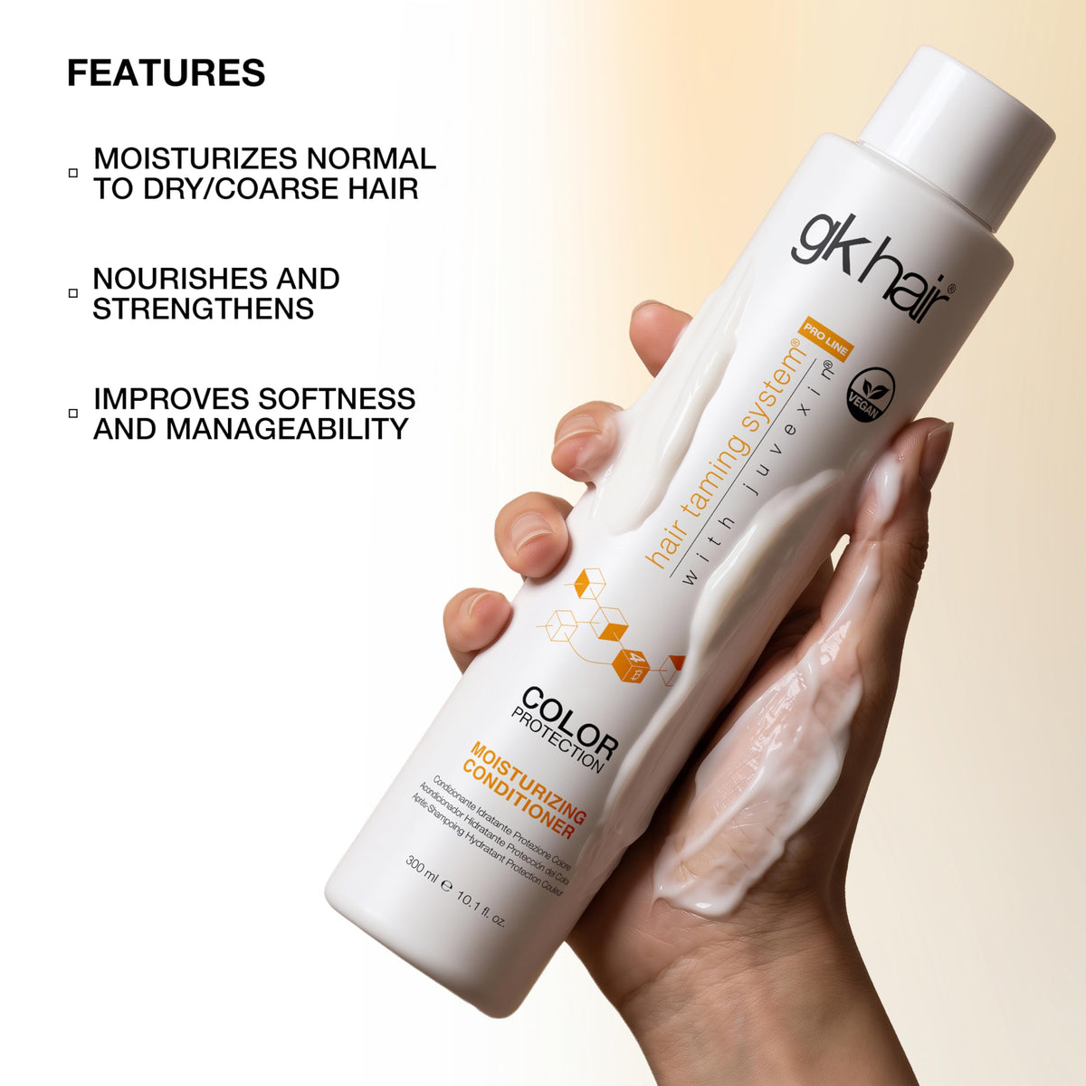 GK HAIR conditioner on spoon demonstrating rich consistency for deep care