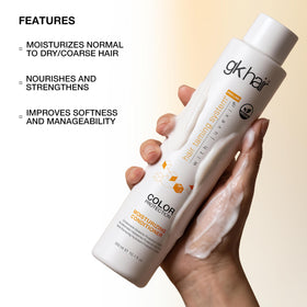 GK HAIR conditioner on spoon demonstrating rich consistency for deep care