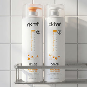 GK HAIR lifestyle bathroom shelf display showing salon-quality home routine benefit
