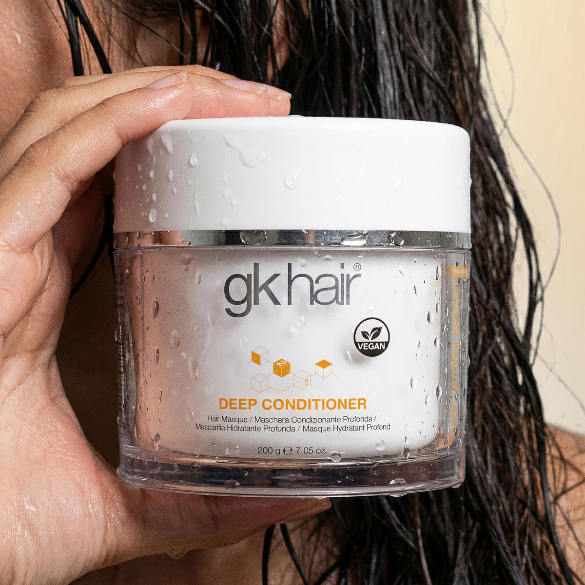 GK HAIR before and after strands illustrating smoother stronger hair