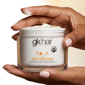 GK HAIR jojoba oil and grain extracts visually highlighting natural ingredients