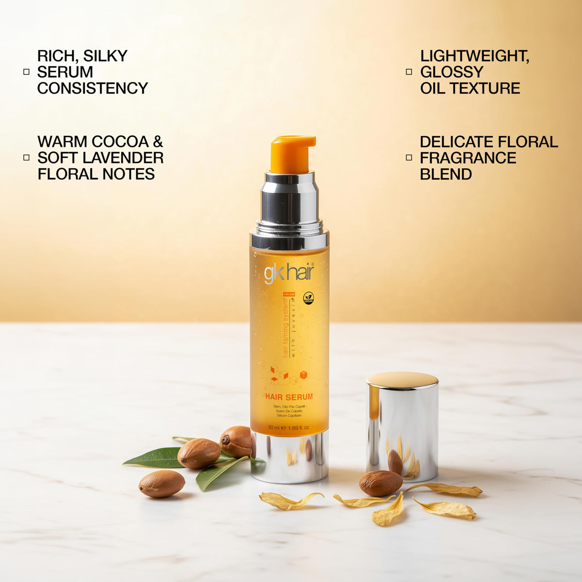 GK HAIR texture drops on hand displaying lightweight, non-greasy feel