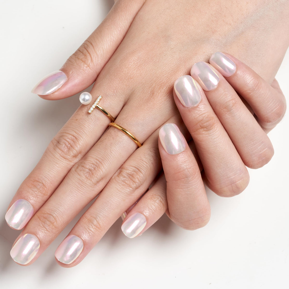GLAMERMAID lifestyle scene at desk showing polished nails for camera-ready confidence