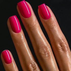 GLAMERMAID hand applying a press-on nail for quick at-home application