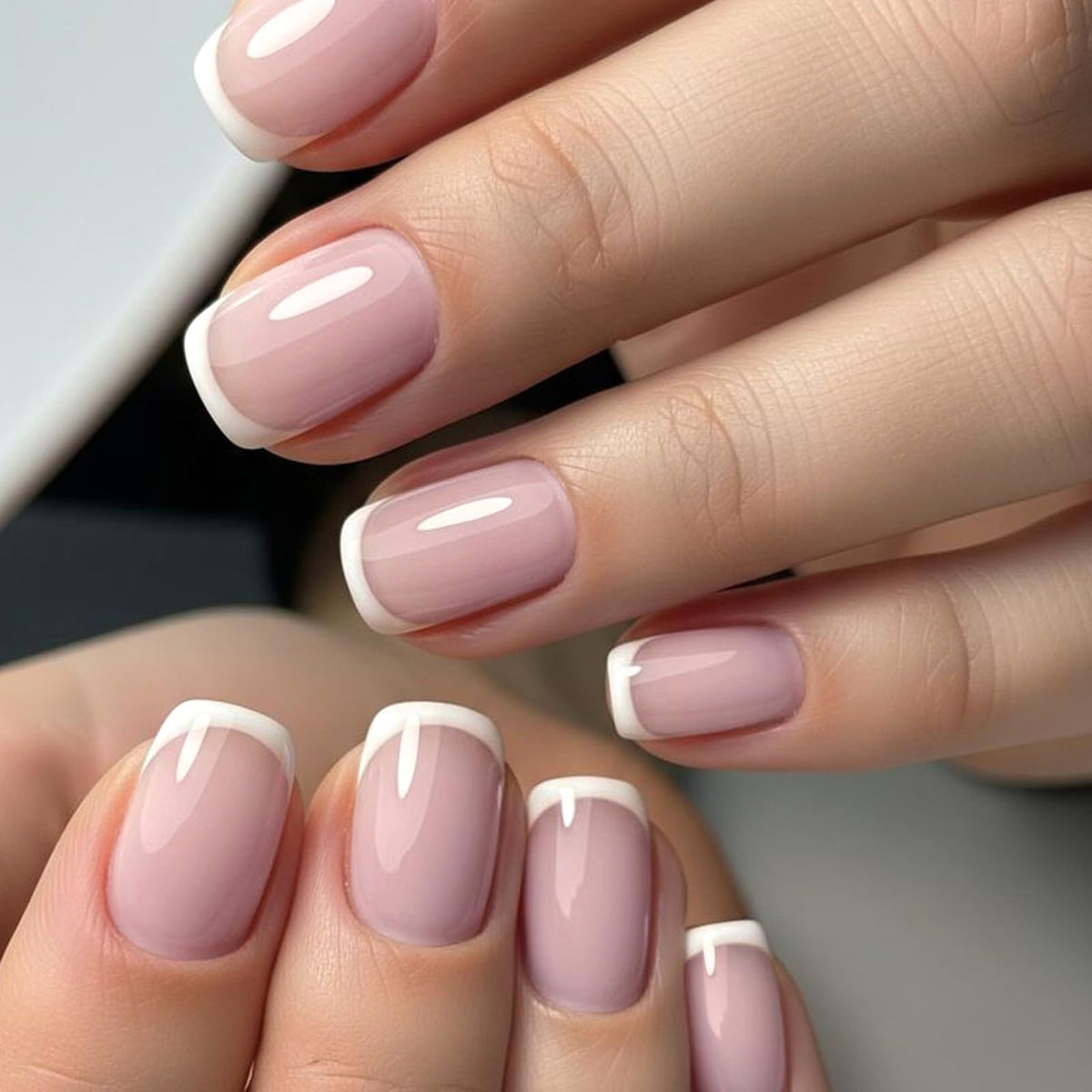 GLAMERMAID close-up of pink french tip nail highlighting natural gel shine