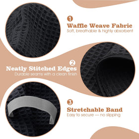 GLIMGLINT towel next to hands to show 40x26.5 inch full-size coverage
