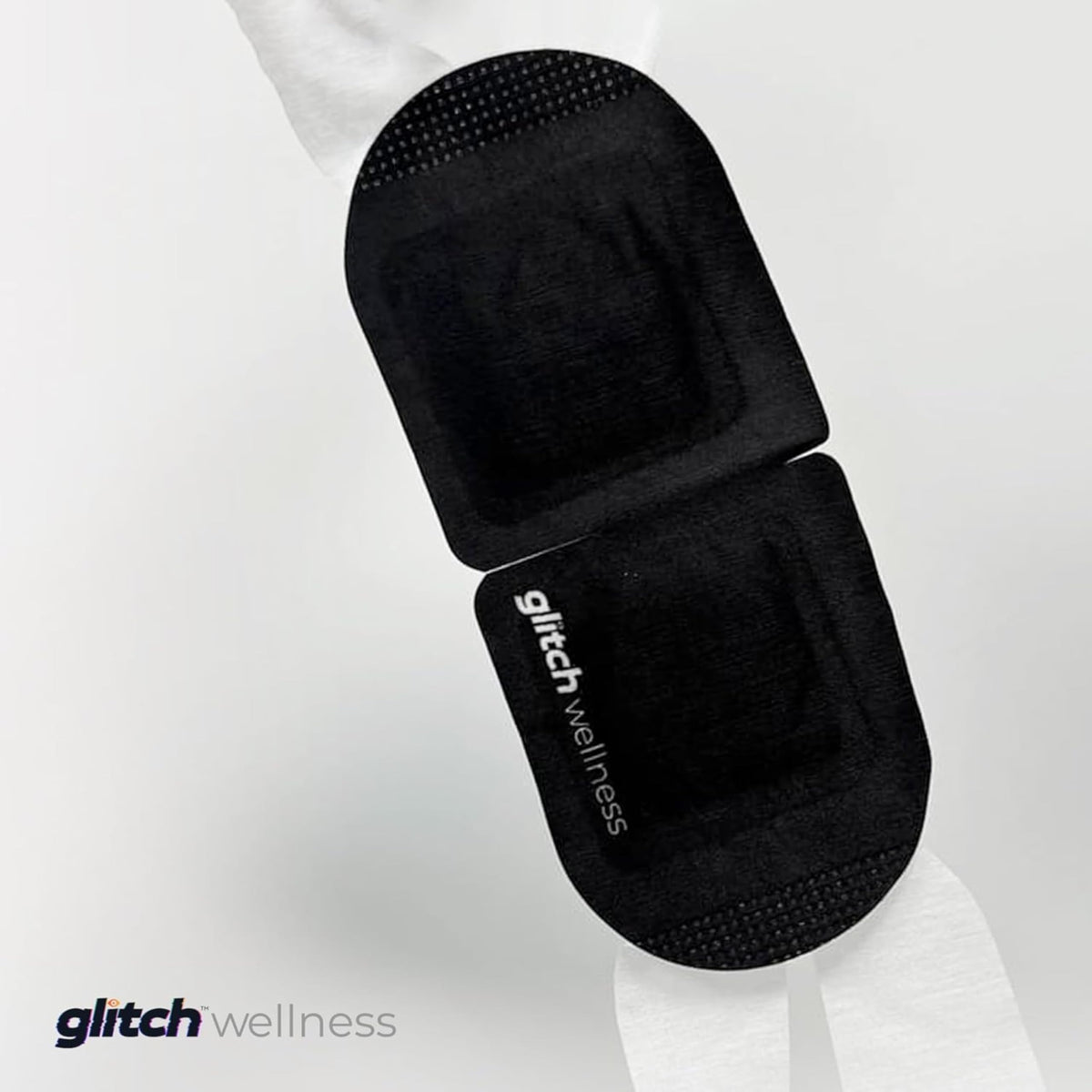 Glitch eye mask on airplane passenger demonstrating TSA-friendly travel relief