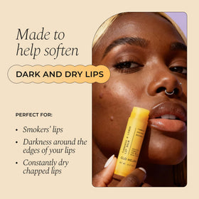 Glo Melanin open stick close-up showing smooth balm texture