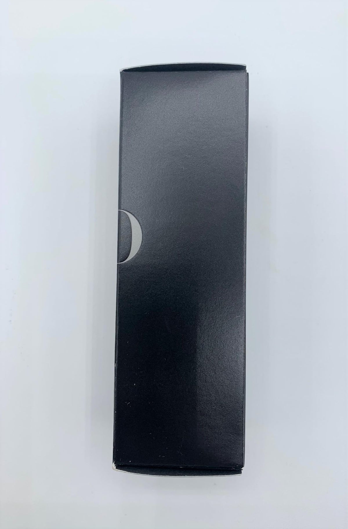 Glo Skin Beauty bottle next to coin showing compact everyday size benefit
