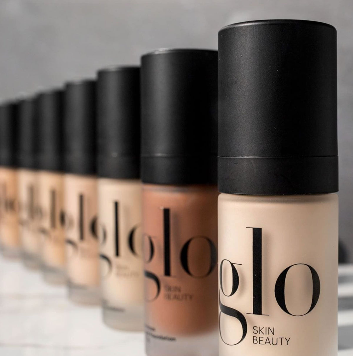 Glo Skin Beauty pump close-up highlighting precise dispensing benefit