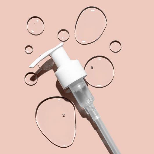 Glo Skin Beauty pump dispensing cleanser demonstrating easy controlled usage