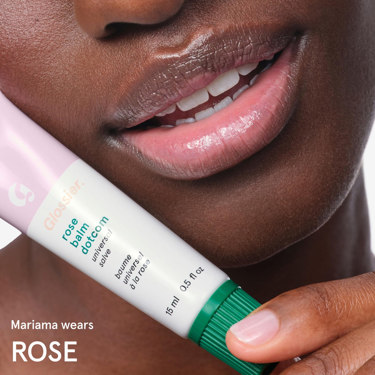 Glossier balm being smoothed onto cuticles to soften and repair dryness