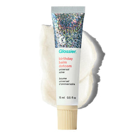 Glossier Balm Dotcom front tube showing Birthday packaging and convenient size