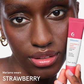 Glossier Balm Dotcom ingredients label highlighting lanolin, beeswax, and castor oil benefits