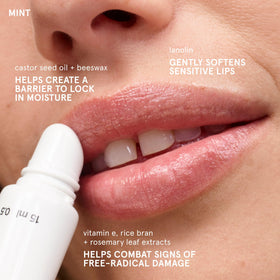 Glossier balm dotcom mint applied to lips for cooling, long-lasting hydration