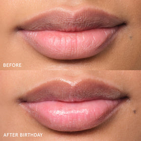 Glossier Balm Dotcom on lips showing hydrated, natural-looking finish