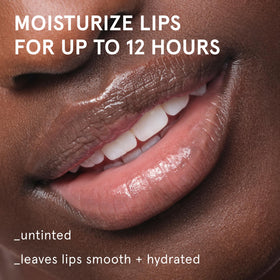 Glossier balm dotcom open tip texture demonstrating smooth glide benefit