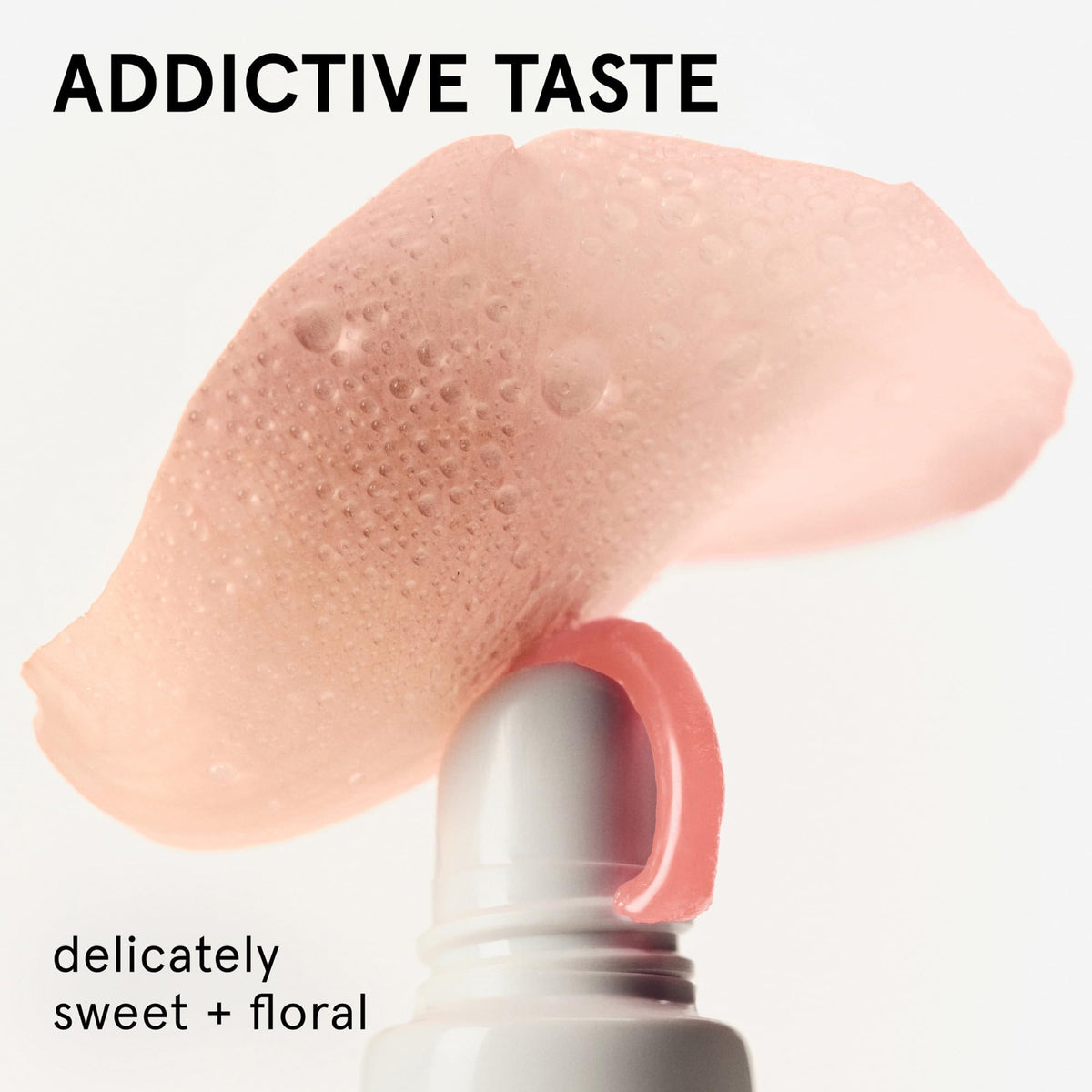 Glossier balm dotcom rose applied on lips for natural pink tint and hydration