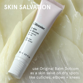Glossier balm dotcom tube open with balm tip ready for direct application