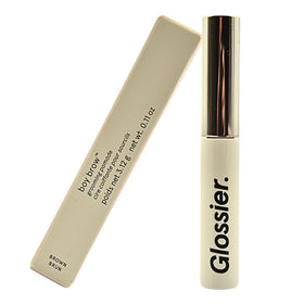 Glossier Boy Brow front packaging in brown showing product benefits