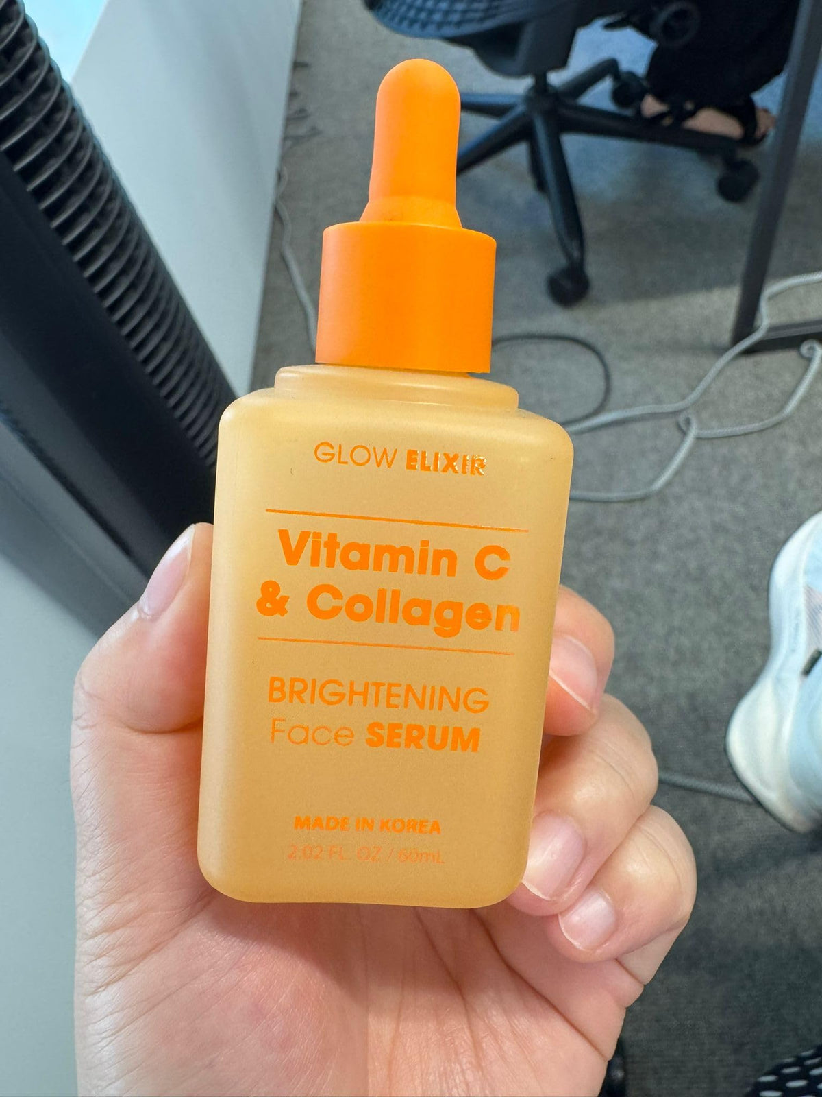 Glow Elixir on bathroom counter in routine setting promoting daily use