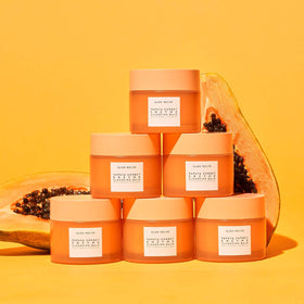 Glow Recipe cleansing balm staged on vanity conveying a calming routine