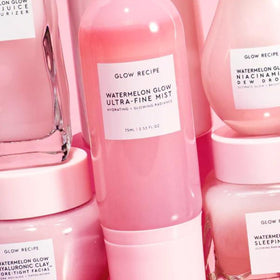Glow Recipe bottle on a vanity with morning light for glowing makeup prep benefit