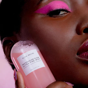 Glow Recipe bottle next to common items showing 75ml travel-friendly benefit