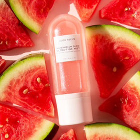 Glow Recipe mist spraying a fine cloud to instantly hydrate skin