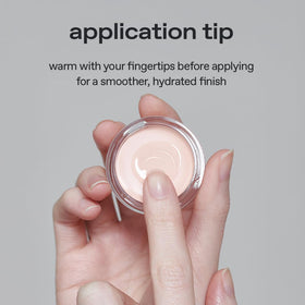 glow rosy salmon end closeup showing corrector tone for neutralizing dark circles