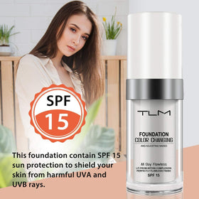 God Blomster foundation bottle beside coin showing compact size and travel convenience