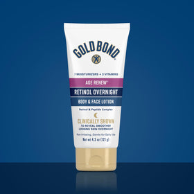 Gold Bond night lotion used on face in bedroom setting for restorative benefit