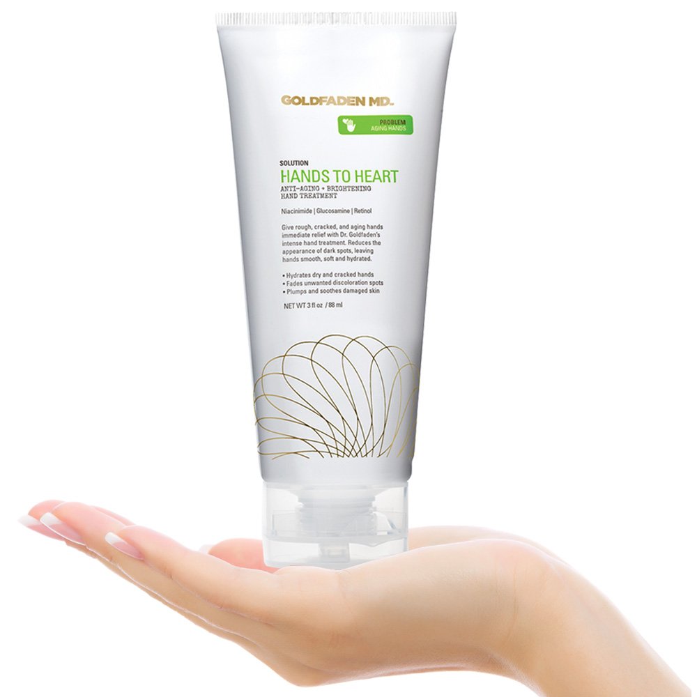 GOLDFADEN MD applied to hands in a lifestyle scene offering visible softness