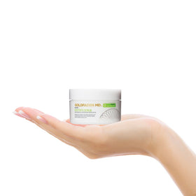 GOLDFADEN MD tube held next to hand showing 1.7 fl oz travel-friendly size