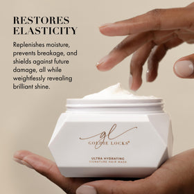 Goldie Locks application in hands demonstrating easy spread and detangling benefit