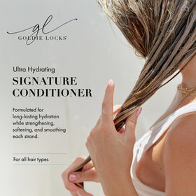 Goldie Locks pump dispensing a measured conditioner amount